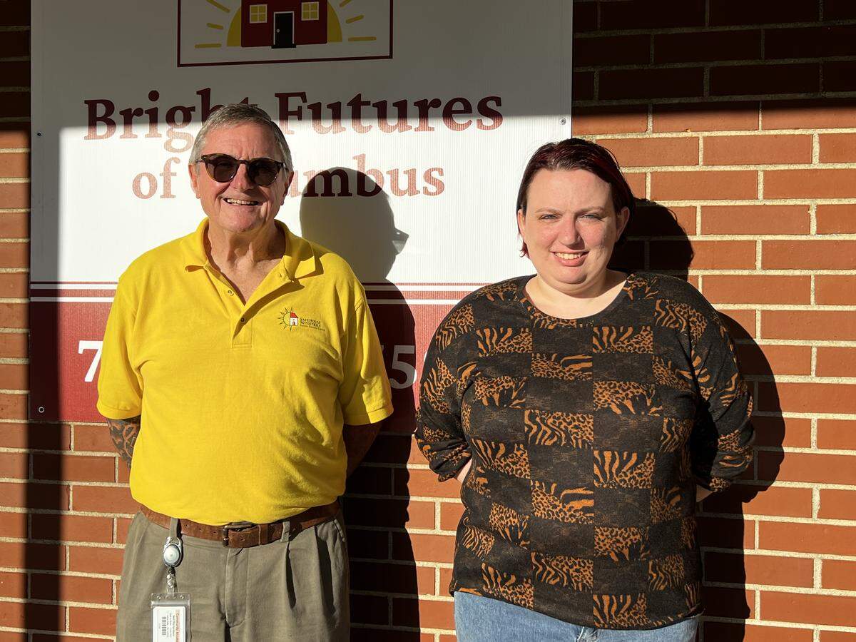 SafeHouse Ministries executive director Neil Richardson and Anna Kowalsky, director of the Bright Futures childcare center, stand Oct. 21, 2025, in front of the new facility SafeHouse opened at 1342 17th St. in Columbus to fill a gap local childcare.