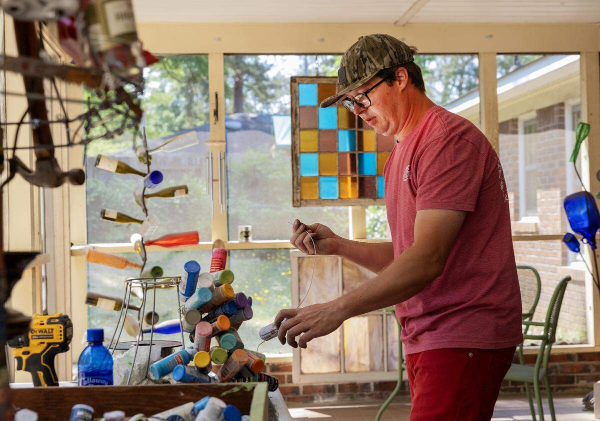 Jarrod Turner of Columbus, pictured April 23, 2026, is one the folk artists participating in the Crossroads Folk Art Festival.