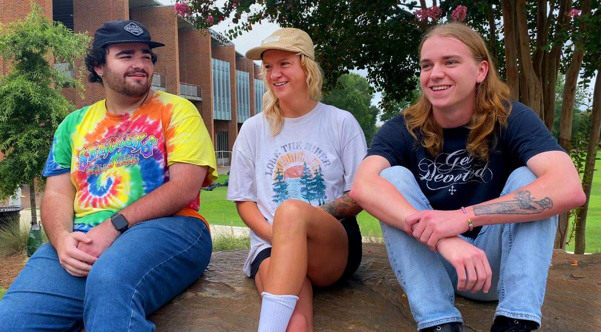 From left, Noah Herrera, Ivey Jones, and Chandler Kelley, members of The Rose Hill Band, talk with Ledger-Enquirer reporter Sundi Rose about the band’s upcoming performance at the second annual Provida Fest,happening in Uptown’s Woodruff Park this weekend.