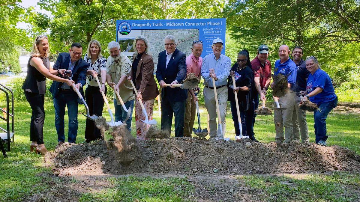 Community leaders break ground May 15, 2026, on the Dinglewood Park Trail, a $2.2 million project that, when complete, will further activate a green space in midtown Columbus and better connect users to their community and each other. “This trail is so important because not only does it improve the quality of life for residents in our community, but it also attracts tourism,” said Becca Zajac, executive director of Dragonfly Trails Inc.