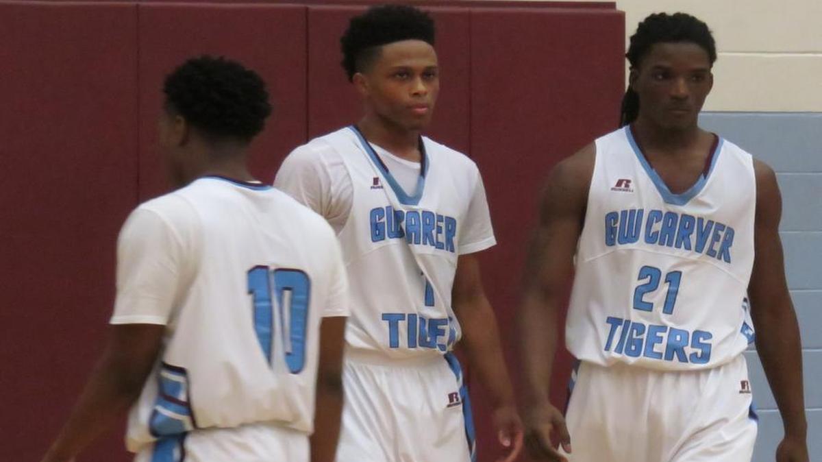 Carver Tigers basketball player Daniel Melvin (21) has been selected as the Region 1-4A Player of the Year.