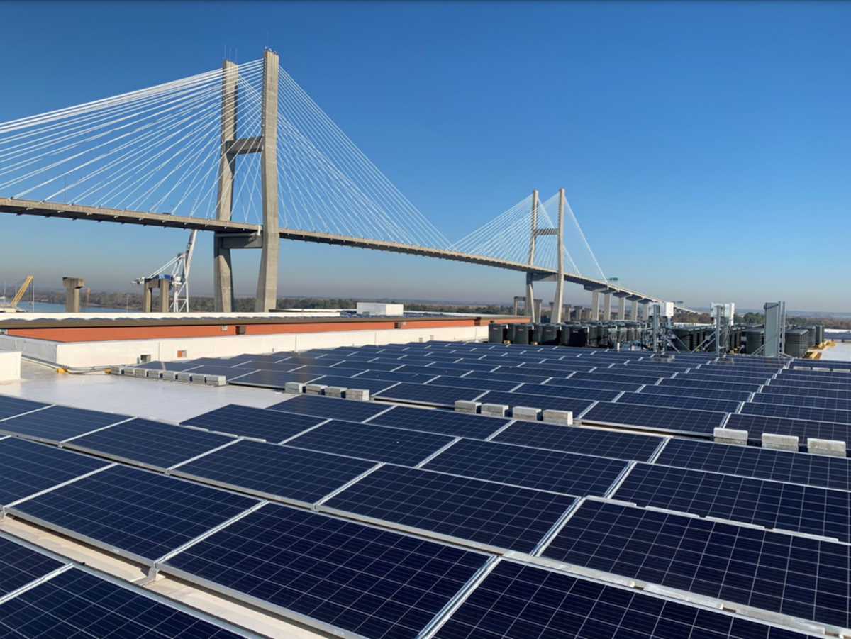 A solar panel array powering buildings in the city of Savannah.