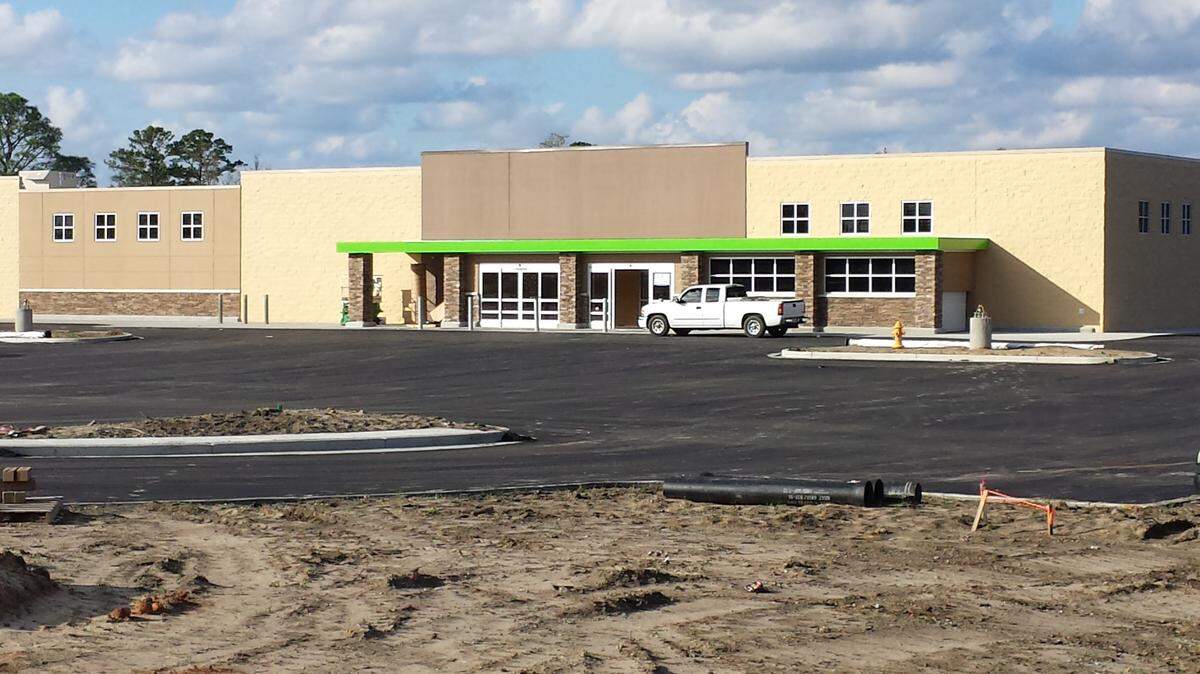 TONY ADAMS/tadams@ledger-enquirer.comThe Wal-Mart Neighborhood Market on U.S. Highway 80 in Phenix City, near the intersection of Woodland Drive, is headed for an opening in early 2016.