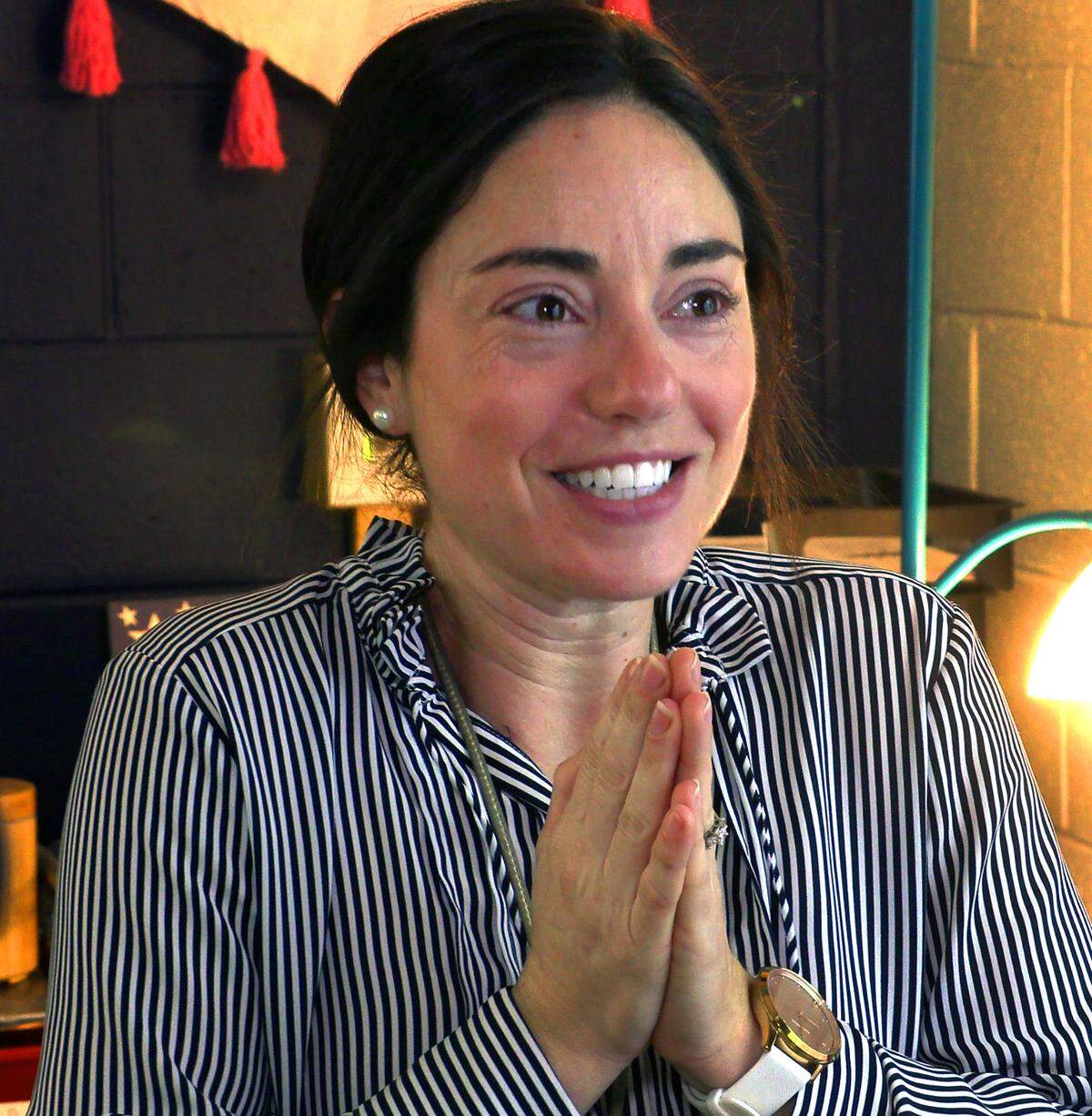 Andrea McCarthy, a teacher at Richards Middle School, reacts after learning she is a Muscogee County School District 2022 Teacher of the Year finalist. 03/29/2022