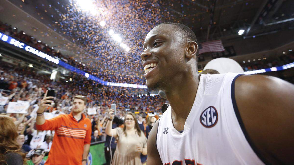 Auburn guard Mustapha Heron celebrates their win against South Carolina after an NCAA college basketball game, Saturday, March 3, 2018, in Auburn, Ala. Auburn won 79-70