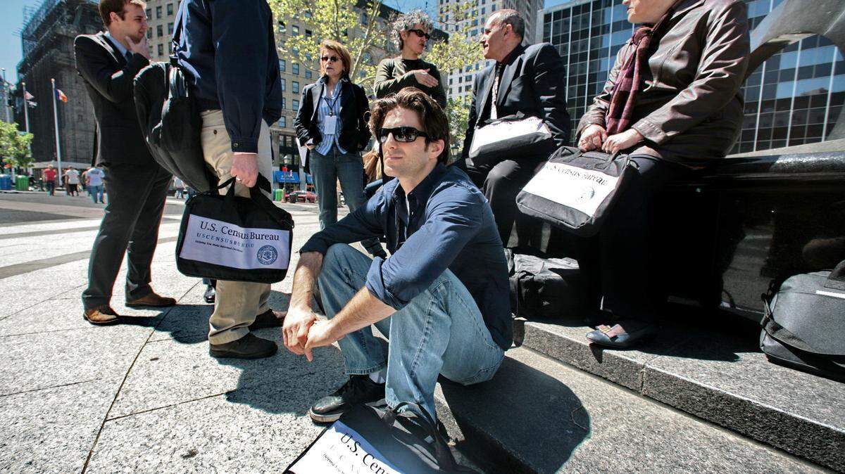 In this April 29, 2010 file photo, census employees assemble after a training course in New York.