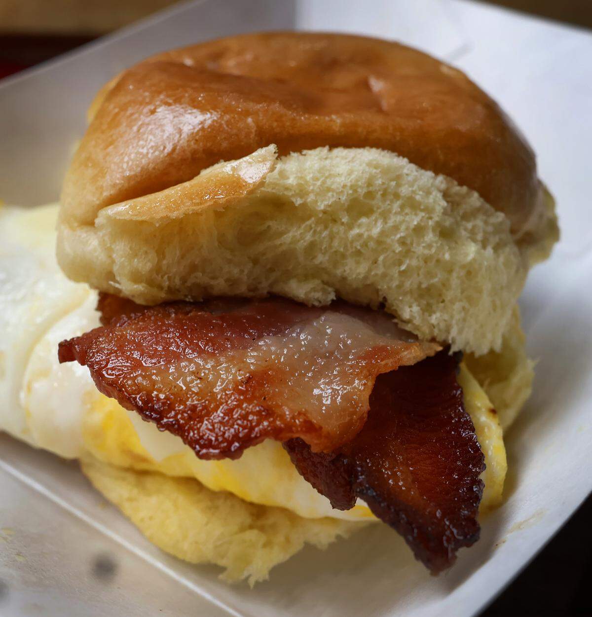 This is the breakfast sandwich with bacon, egg and cheese on a brioche bun at The Bait Shop, 1107 54th St. in Columbus, pictured Dec. 23, 2025.