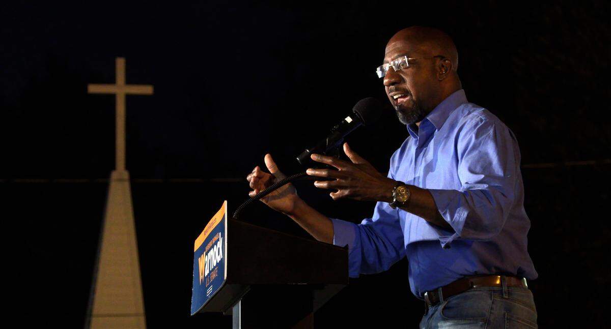 U.S. Senator Raphael Warnock campaigns Monday night at Abundant Life Full Gospel Outreach Church in Columbus, Georgia. 11/07/2022