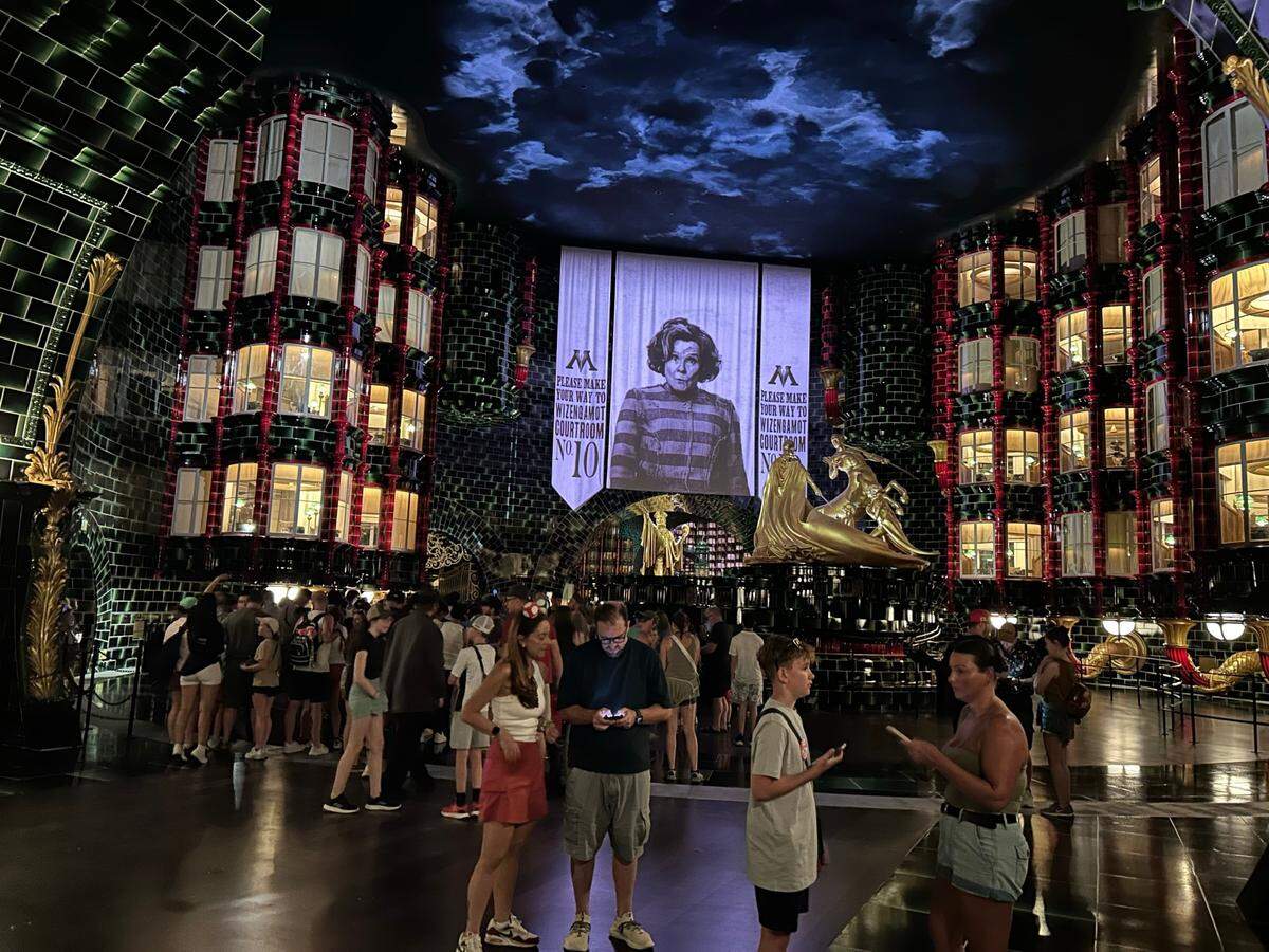 In this undated photo, visitors are pictured in The Wizarding World of Harry Potter, one of five lands featured in Universal Studio Orlando’s Epic Universe.