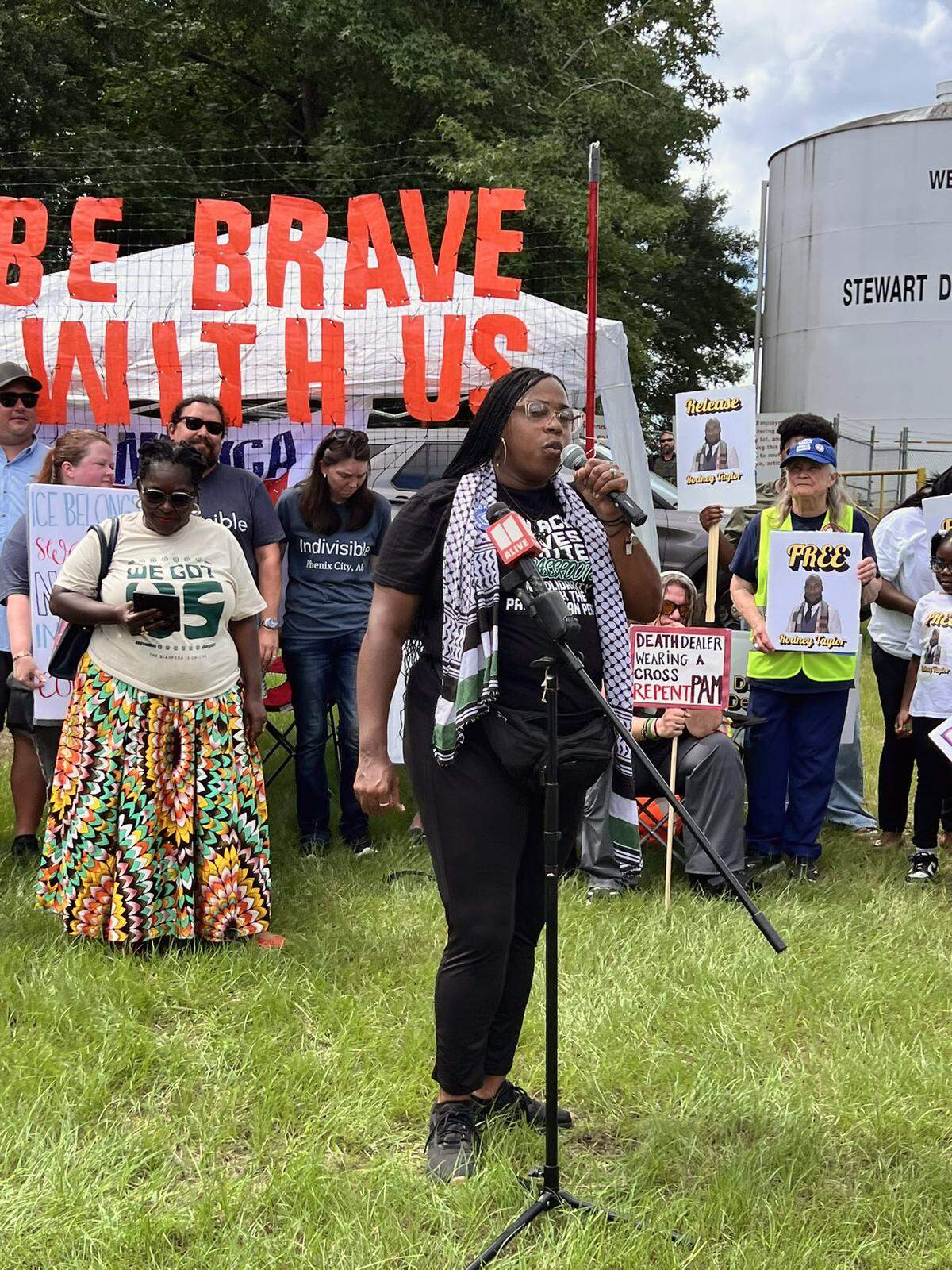 El Refugio, Black Alliance for Just Immigration, Indivisible Georgia Coalition, Indivisible Columbus, Indivisible Phenix City, 50501 Georgia and New Disabled South conducted a protest Aug. 12, 2025, outside the Stewart Detention Center in Lumpkin, Georgia, to demand the release of Rodney Taylor and others organizers say have been wrongfully held in ICE detention.