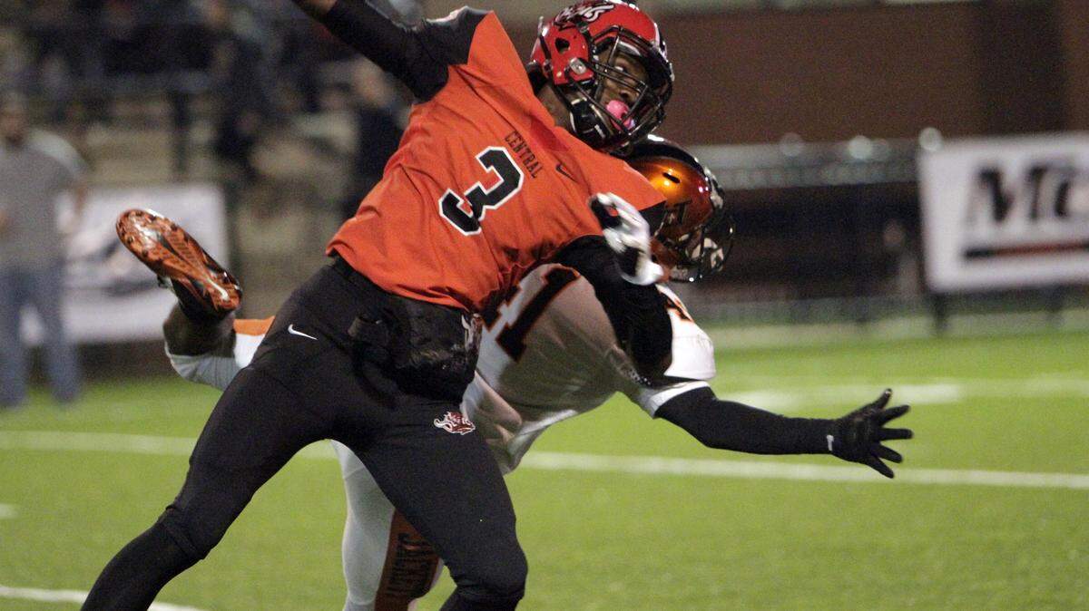 ROBIN TRIMARCHI rtrimarchi@ledger-enquirer.com 
 Central High's Jaren Spivey draws the interference call on McGill-Toolen's Josh Williams in Class 7A Region 2 semifinal play at Garrett-Harrison Stadium Friday. 11.20.15