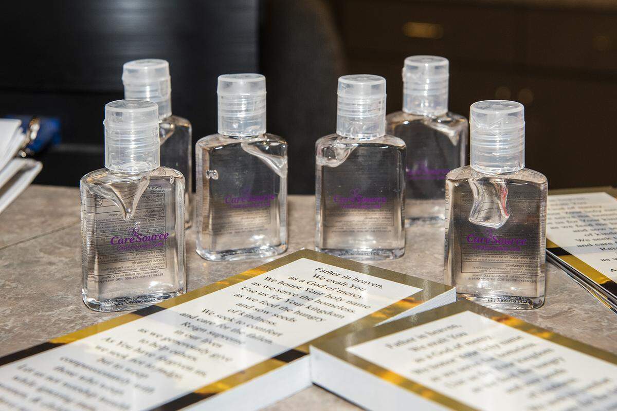 Bottles of hand sanitizer on the counter for volunteers and guest as they enter the Valley Rescue Mission for Thanksgiving Dinner service, Thursday, November 26, 2020