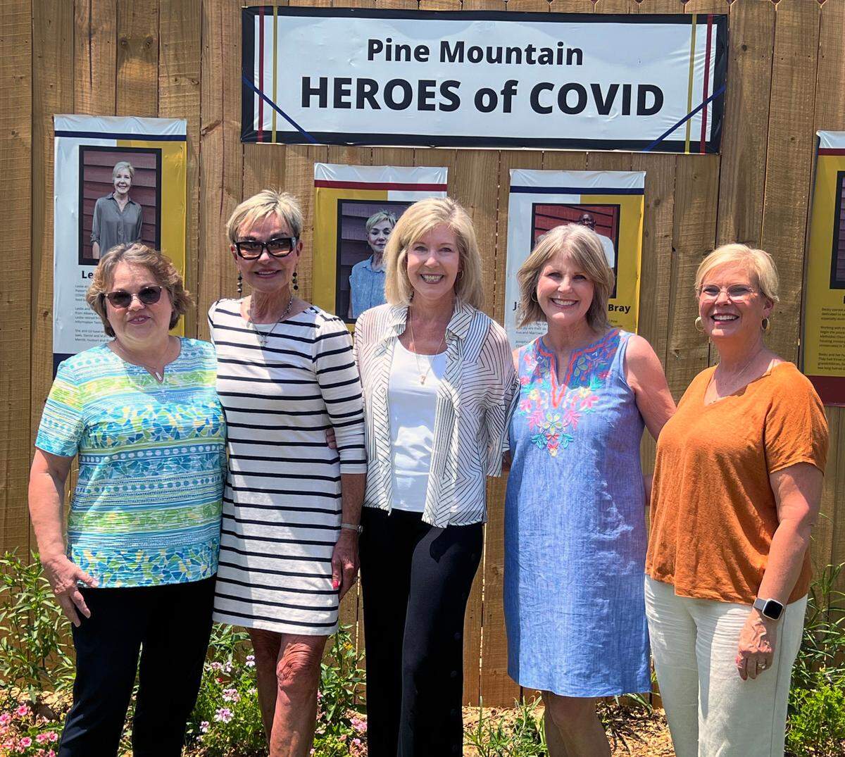 Volunteers for the Pastor’s Pantry at First United Methodist Church stand in front of the Chipley Historical Center’s new garden exhibit honoring Pine Mountain, Georgia heroes who combated food insecurity during the coronavirus pandemic.