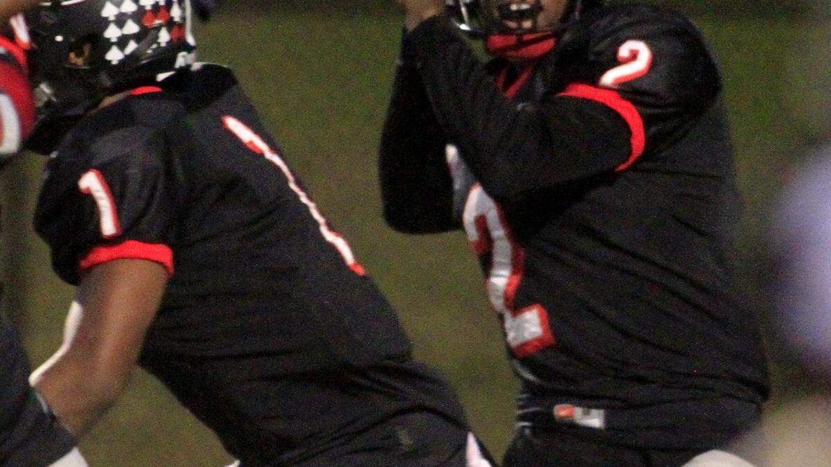 ROBIN TRIMARCHI rtrimarchi@ledger-enquirer.com 
 Shaw High quarterback B.J. Knight throws the ball against LaGrange in first half action at Kinnett Stadium Thursday. 10.22.15