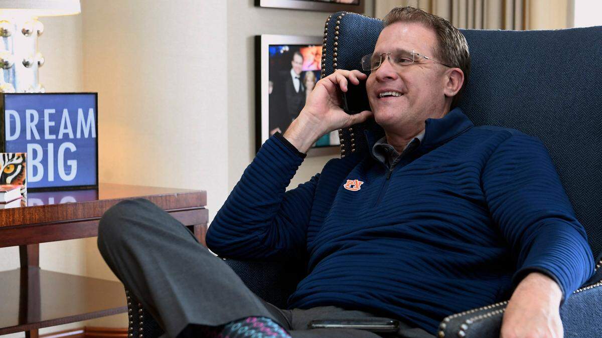 Auburn head coach Gus Malzahn talks to Mark-Antony Richards after Richards announced he’s going to play college football with Auburn, Wednesday, Feb. 6, 2019 in Auburn, Ala. (AP Photo/Todd J. Van Emst)