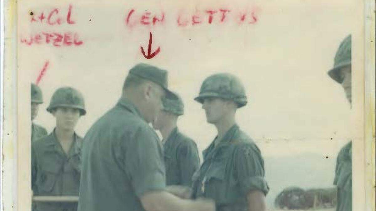 Then Maj. Gen. Charles M. Gettys, commander of the Americal Division, pins the Silver Star on Lt. John Dolan for actions on Nov. 17, the first day of the Nui Chom battle.  Lt. Col. Sam Wetzel is on the left edge of the picture.