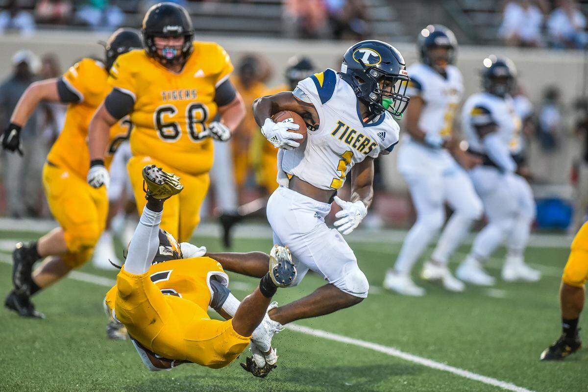 Troup’s Kullum Irvin breaks through the tackle of Harris County’s Braden Wortham for first down yardage in the 1st quarter of the game against Harris County Friday night, September 4, 2020
