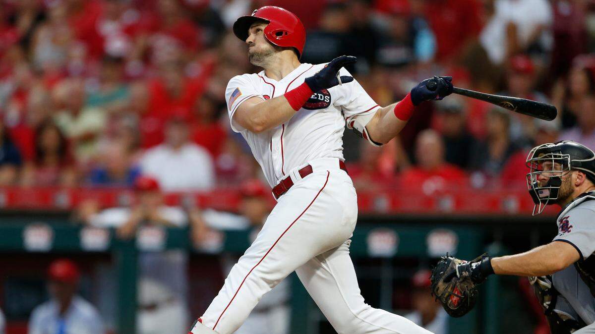 Cincinnati Reds’ Adam Duvall follows through on a three-run home run off Chicago White Sox starting pitcher Lucas Giolito during the fifth inning of a baseball game, Tuesday, July 3, 2018, in Cincinnati