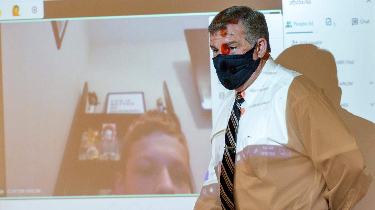 Phenix City Schools superintendent Randy Wilkes greets a student learning virtually at Central High School on Tuesday, August 18, 2020 in Phenix City, Ala.