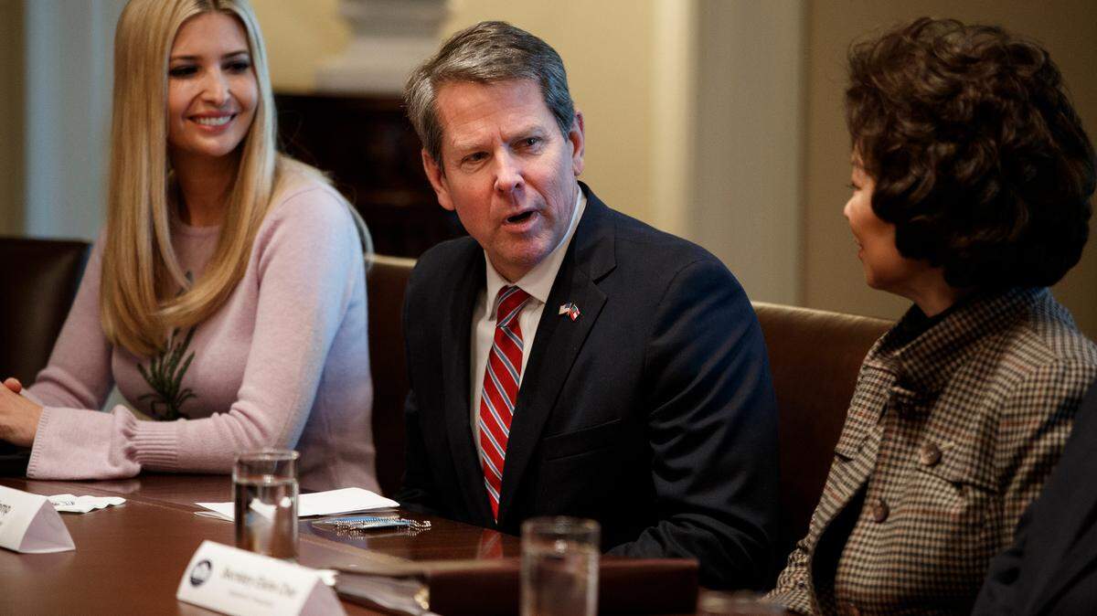Ivanka Trump, left, and Secretary of Transportation Elaine Chao, right, listen as Gov.-elect Brian Kemp, R-Ga., speaks to President Donald Trump during a meeting with newly elected governors in the Cabinet Room of the White House on Dec. 13, 2018, in Washington, D.C.