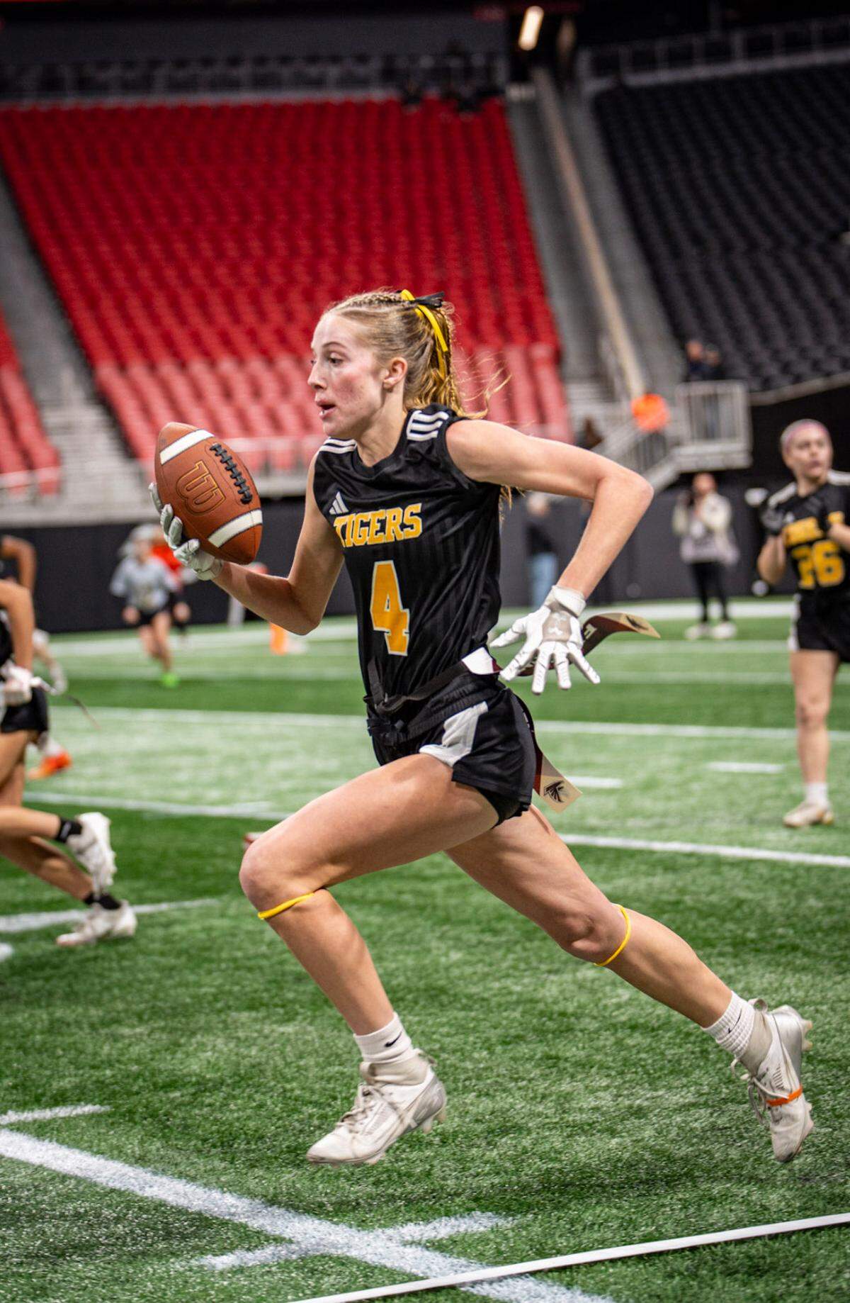 Harris County senior defensive back Pearson Pettit returns an interception during the Georgia High School Association Division 1 flag football state championship game Dec. 15, 2015, at Mercedes-Benz Stadium in Atlanta. The Tigers beat Washington County 32-0 to win the title.