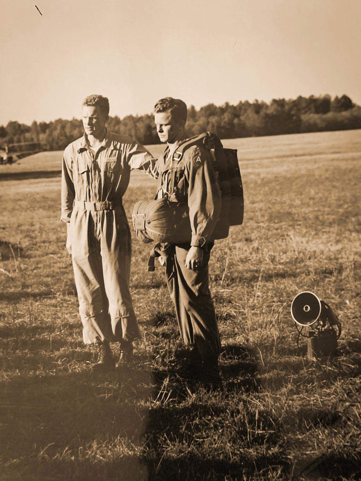 A family photo of Hal Moore (center) during a deployment.