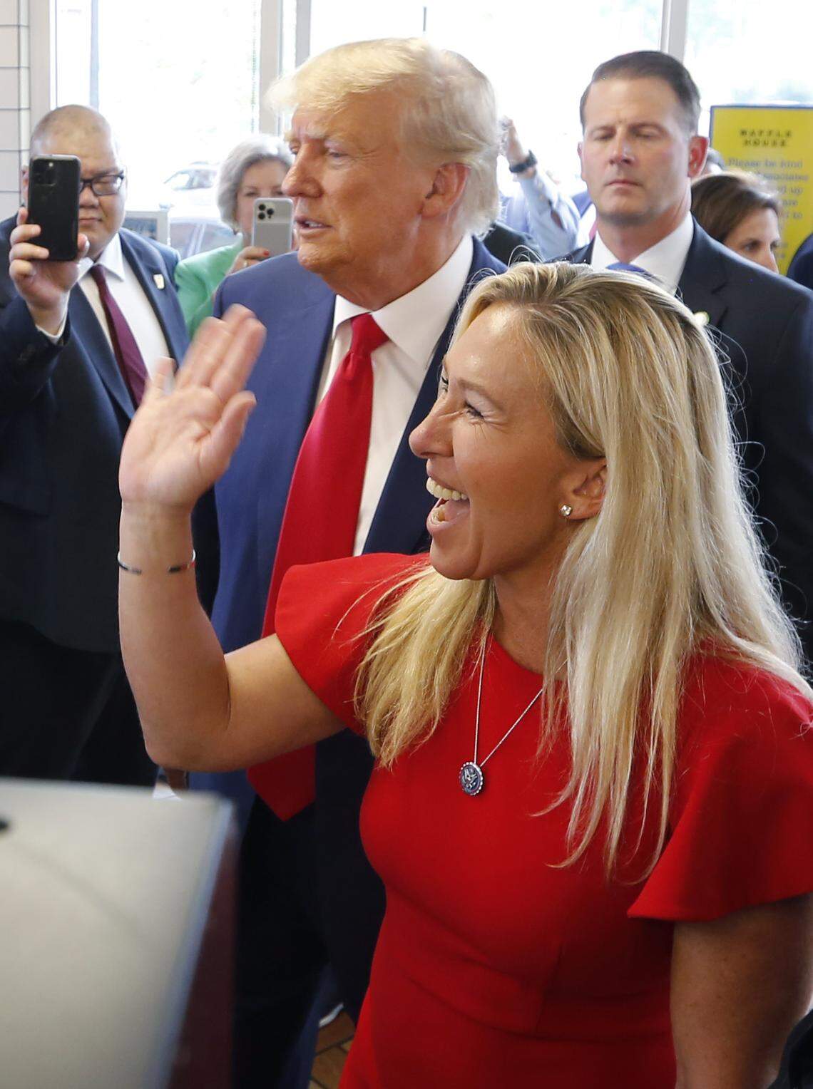 Former president Donald Trump is joined by U.S. Rep. Marjorie Taylor Greene during a visit to the Waffle House at 1326 Veterans Parkway in Columbus, Georgia after his speech at the Columbus Convention & Trade Center. 06/10/2023