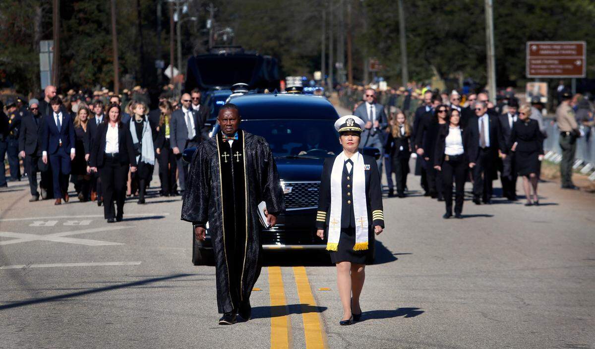After leaving Maranatha Baptist Church in Plains, Georgia, the funeral procession for Rosalynn Carter approaches Church Street( Highway 280). 11/29/2023