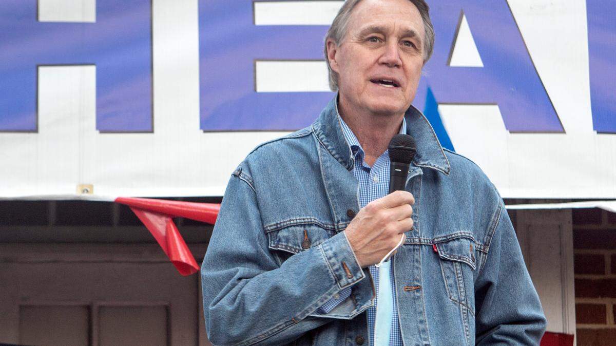 Senator Purdue speaks to a crowd of supporters as he campaigns for re-election on Friday, Oct. 30, 2020, at the Muscogee County Republican Party Headquarters in Columbus.