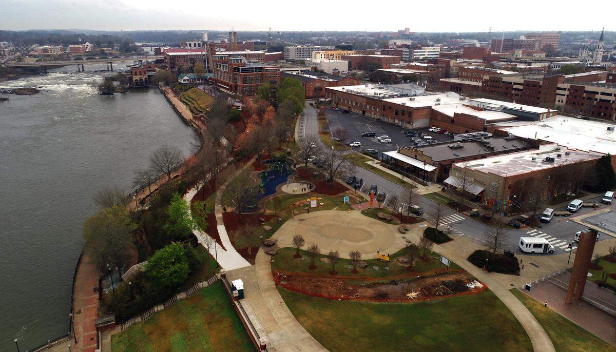 Woodruff Park (foreground) in Columbus, Georgia overlooks the Chattahoochee River. 03/17/2022