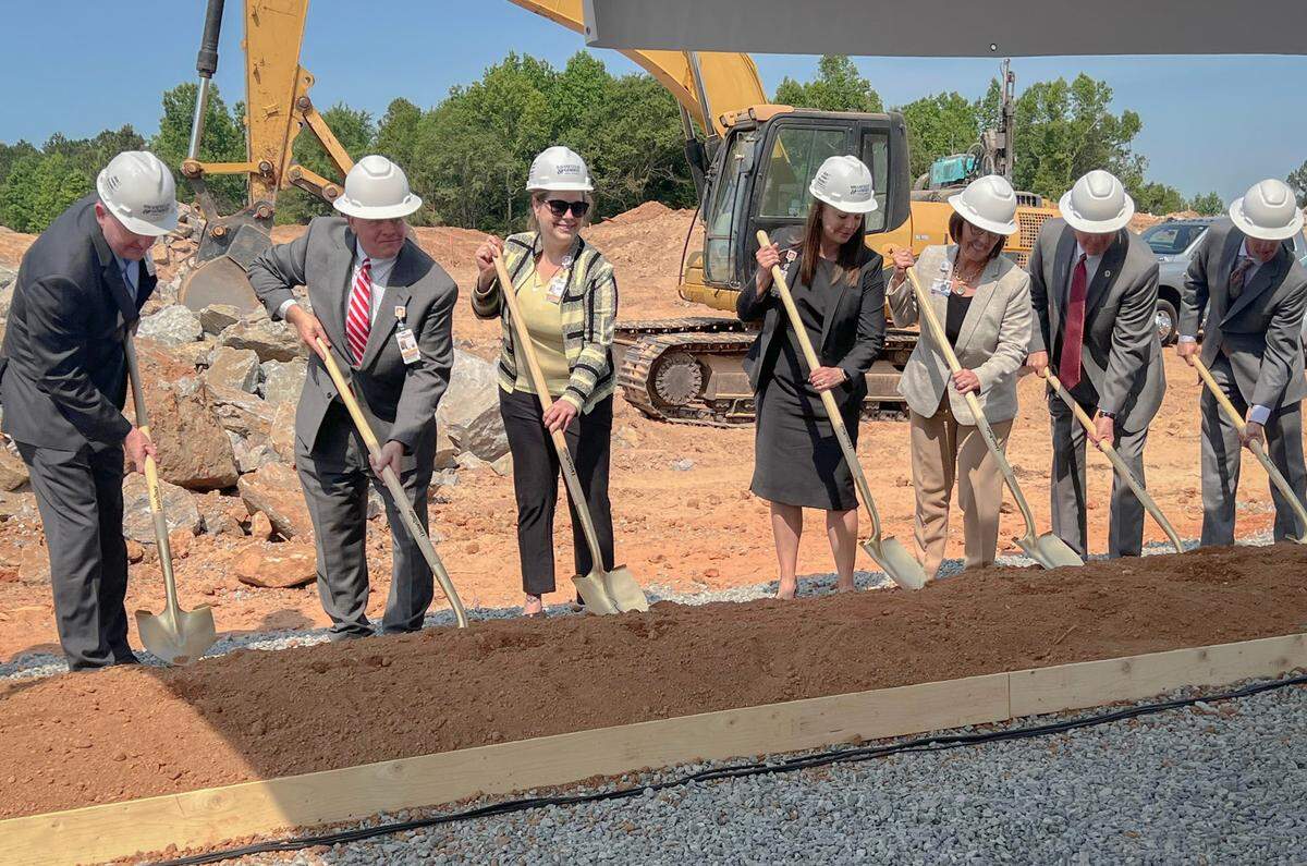 Piedmont and Encompass Health leaders break ground on an inpatient rehabilitation hospital at 8321 Veterans Pkwy on May 18, 2022, in Columbus, Ga.