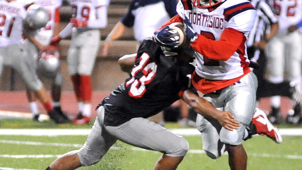 DARRELL ROADEN/Special to the Ledger-EnquirerNorthside responded to Shaw's 91-yard scoring drive with a 95-yard kickoff return by Kalan Watts, breaking past the tackle attempt of Shaw kicker Giovanni Galvan.