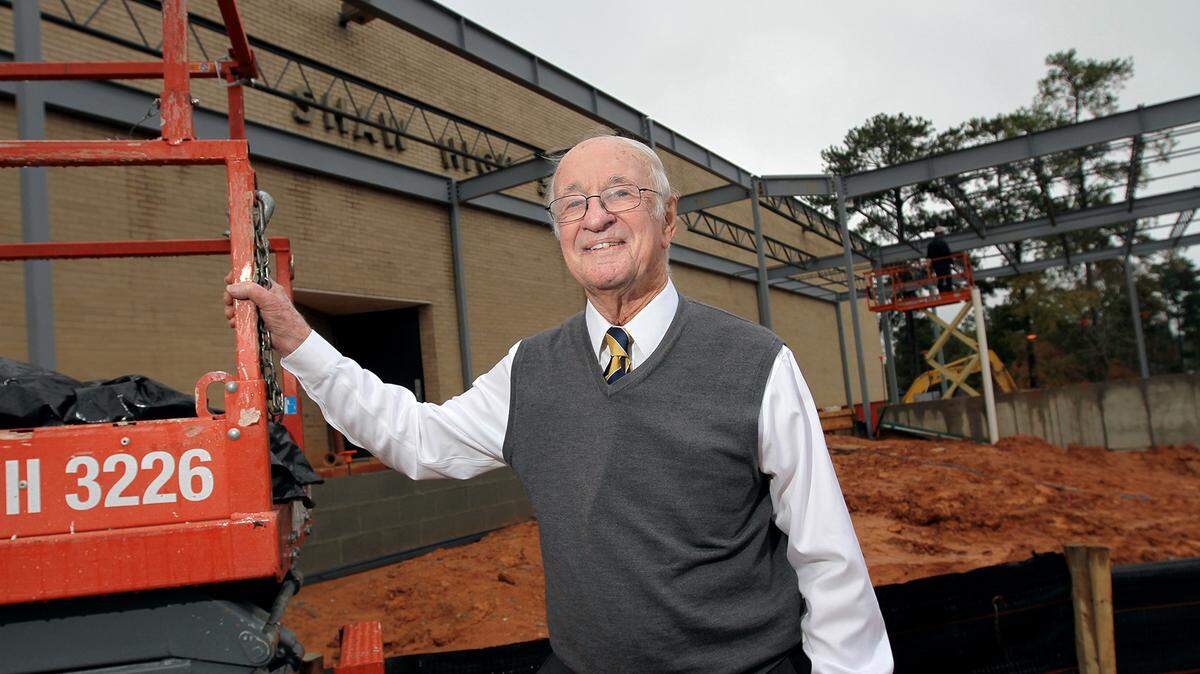 Bobby Hecht stands outside the new construction at Shaw High School. Hecht is retiring as the director of construction for the Muscogee County School District.