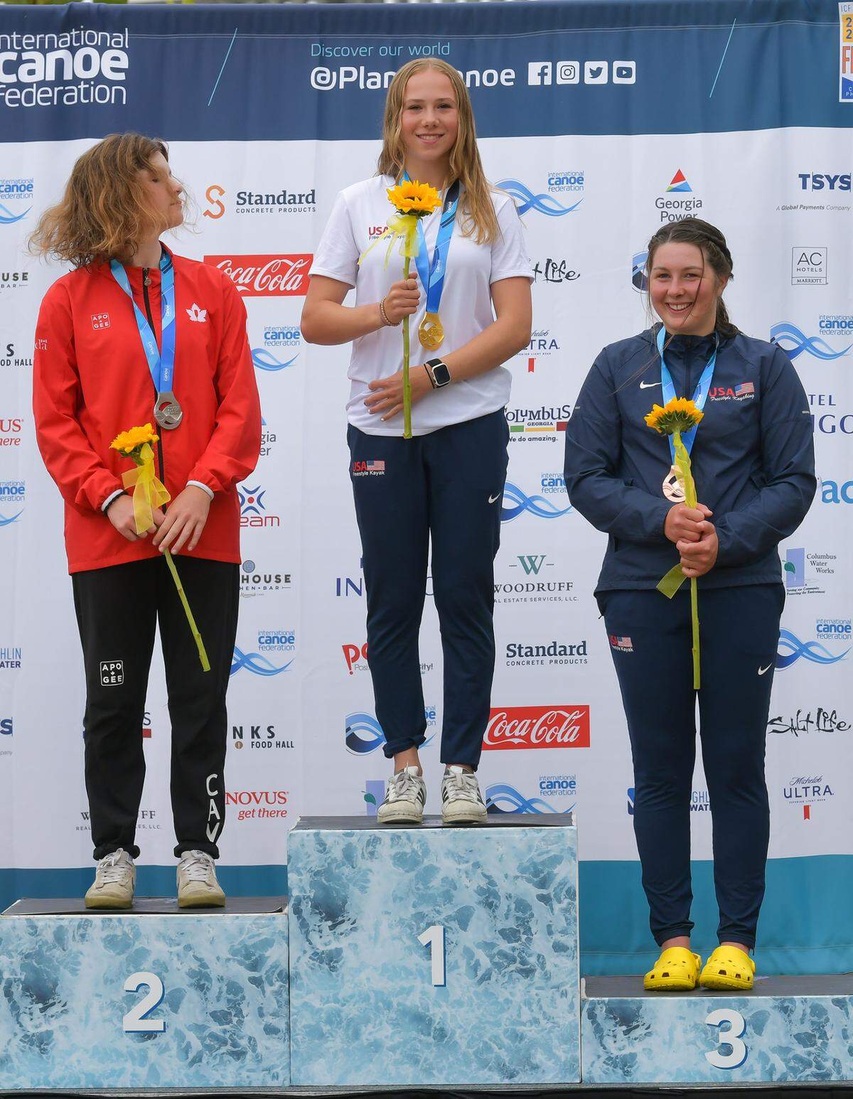 Makinley Kate Hargrove, center won the Women’s Kayak Surface Junior Final Friday afternoon to claim the gold medal at the 2023 ICF Canoe Freestyle World Championships in Columbus, Georgia. Sophie Gilfillan of Canada,left, was the silver medalist, and Eleanor Knight of team USA took home the bronze medal. 10/13/2023