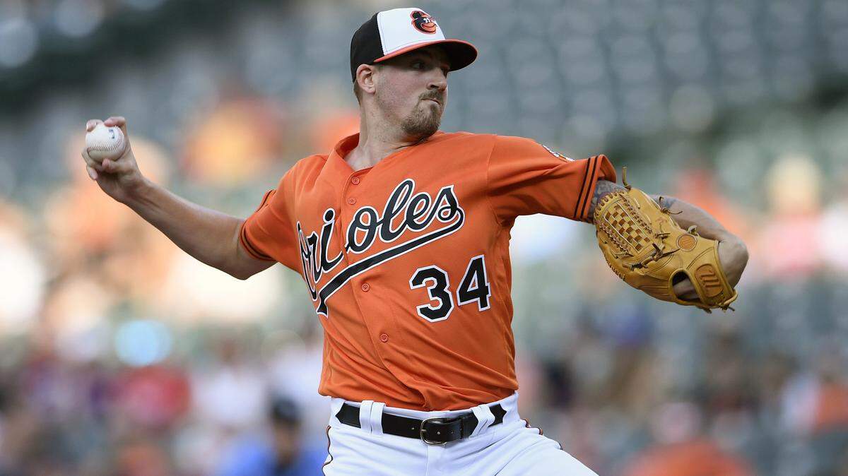 Baltimore Orioles starting pitcher Kevin Gausman delivers during the first inning of a baseball game against the Tampa Bay Rays, Saturday, July 28, 2018, in Baltimore