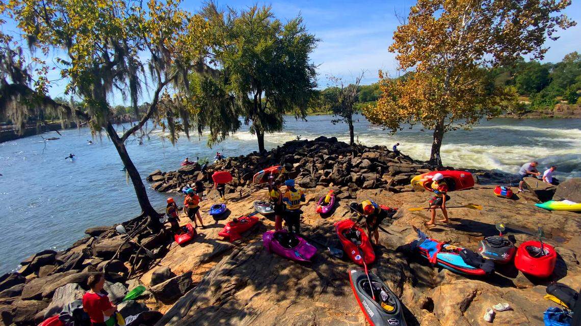 Kayakers prepare for practice runs Thursday morning in preparation for the 2023 ICF Canoe Freestyle World Championships on the Chattahoochee River in Columbus, Georgia. 10/05/2023