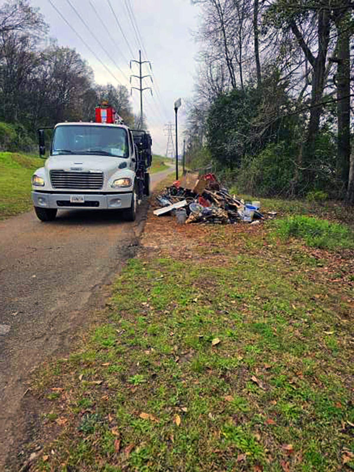 This photograph is from a report to Columbus, Georgia, city leaders from the Department of Public Works about homeless camps in Columbus, Georgia.