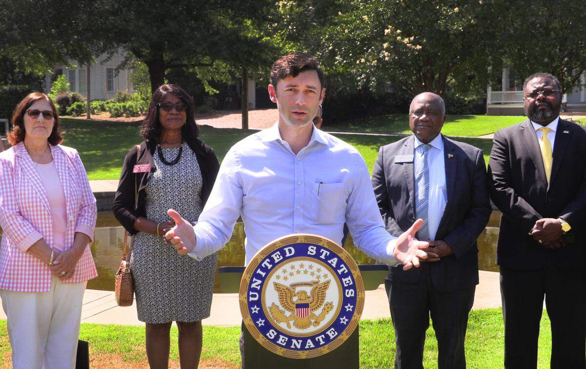 U.S. Sen. Jon Ossoff answers questions Wednesday during a press conference at Heritage Park in Columbus.