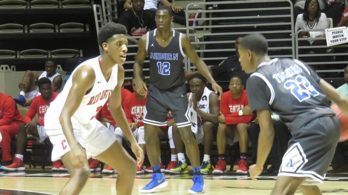 Central’s Donald Jackson (3) steadies himself on defense against Auburn’s Chad Morgan (23) in the second quarter of the AHSAA Class 7A Central Regional championship. Jackson’s performance helped the Red Devils advance to the Class 7A quarterfinals in Birmingham