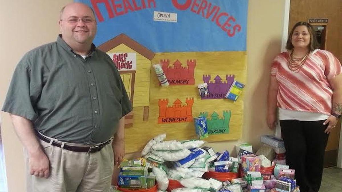 Tony Crosby and Dawn Wilson show some of the items collected.