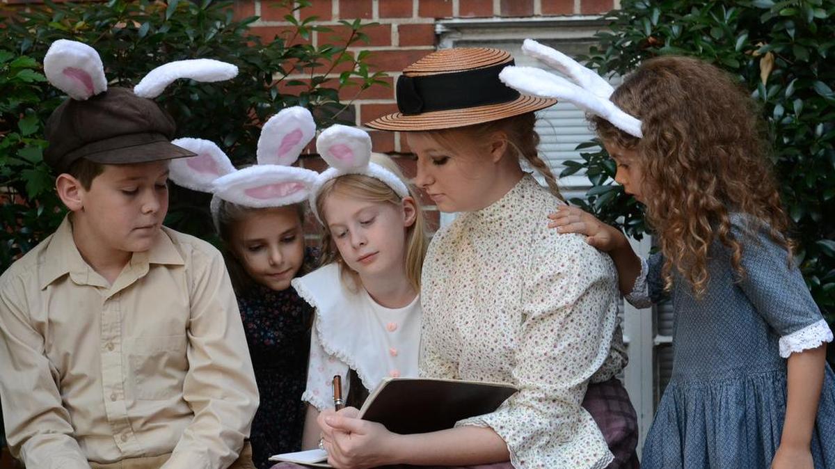 Jackson Taylor, from left, Rebecca Timberlake, Amina Wright, Caelyn Clemons (Beatrix Potter) and Giselle De Loia in a scene from “The Adventures of Beatrix Potter and Friends” at the Family Theatre in Columbus.