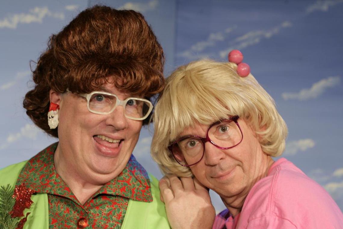 Bertha Bumiller (Paul Pierce) and her daughter, Charlene (Ron Anderson), share a bonding moment in “A Tuna Christmas.”