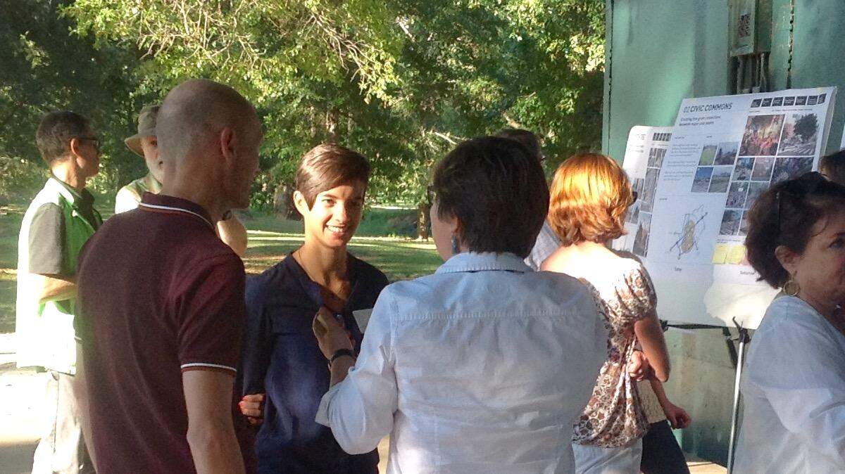 Gehl planners Julia Day, facing camera, and Andreas Rohl, to her right, speak to residents about the “Minimum Grid” draft proposal today at Lakebottom Park.