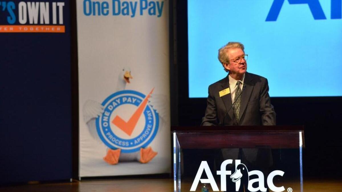 Dan Amos, Aflac chairman and chief executive officer, speaks at the firm’s annual meeting Monday at the Columbus Museum. --