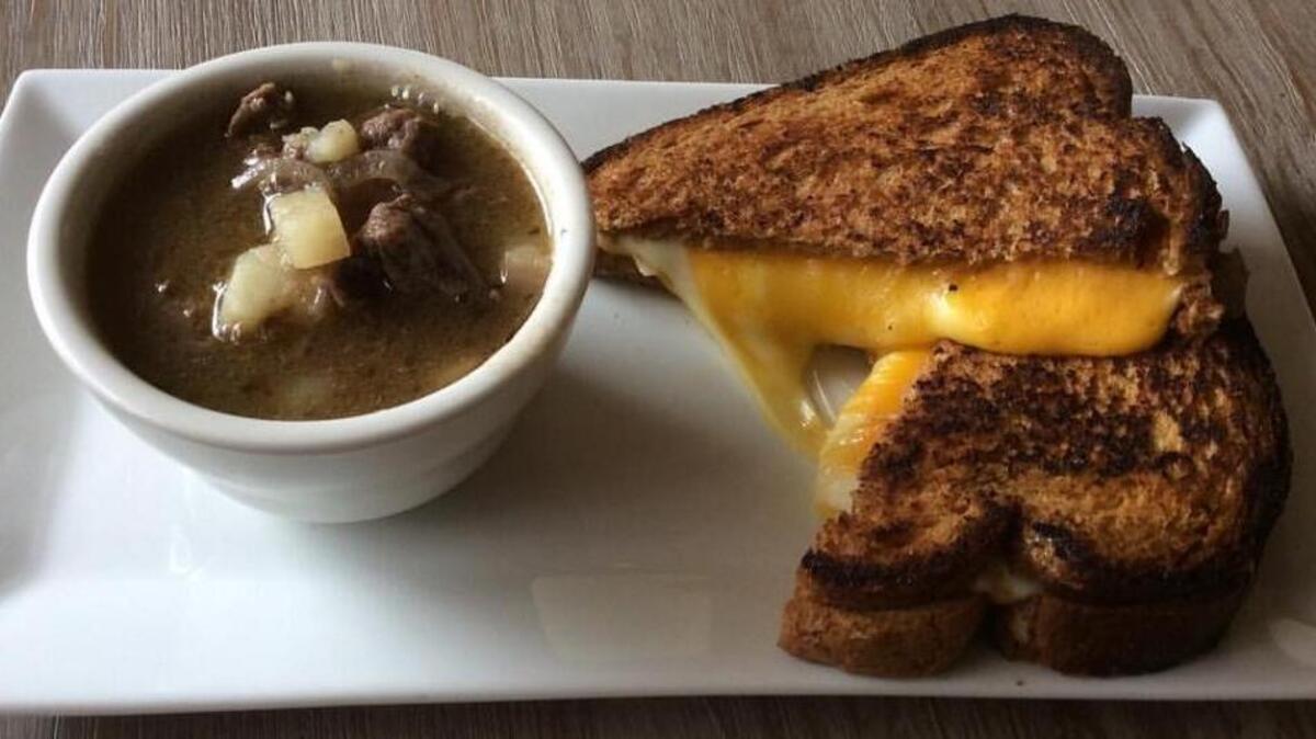 The restaurant’s menu has included gourmet grilled cheese with beef and potato soup. --