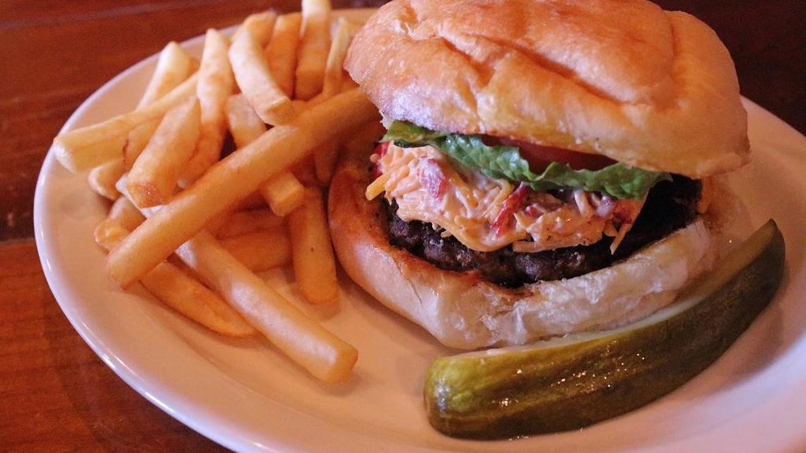 The Blackbird Cafe in Woodbury, Ga., about an hour north of Columbus, made the “100 Plates Locals Love” list last year for its pimento cheese burger, shown here. This year, The Black Cow restaurant in downtown Columbus was honored by “100 Plates” for its bacon and pimento cheeseburger. --