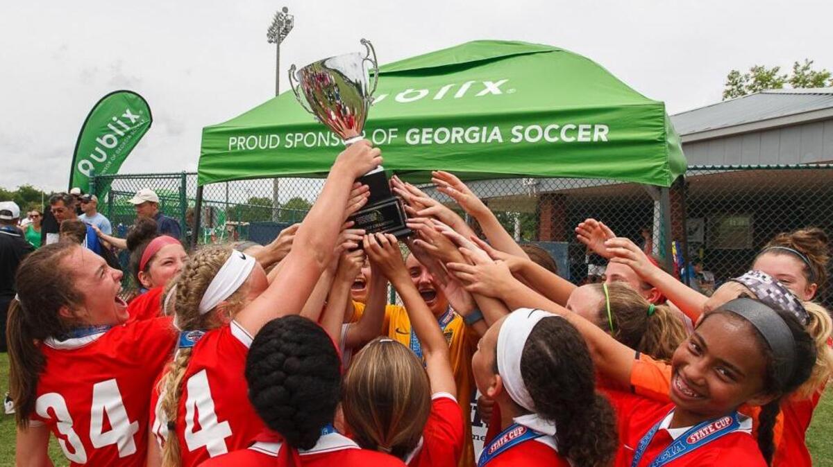 A team celebrates during the U.S. Youth Soccer Georgia State Cup held previously in Columbus. The competition is back in Columbus this three-day Memorial Day weekend. --
