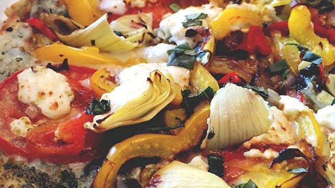 A loaded veggie pizza is on the Newk’s menu. --