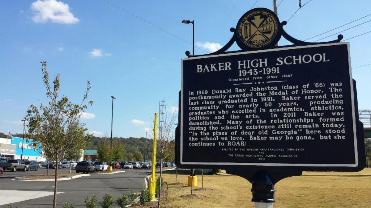The historic marker dedicated to the former Baker High School in Columbus is at the corner of Victory Drive and Benning Drive. In the background is the new Walmart Supercenter that opened in June. --