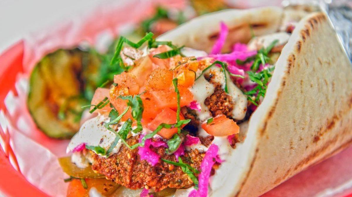 A falafel and veggie wrap is served at Pita Mediteranean Street Food, which has locations in the Atlanta area and is opening a location at 6600 Whittlesey Blvd. in Columbus early in 2017. --